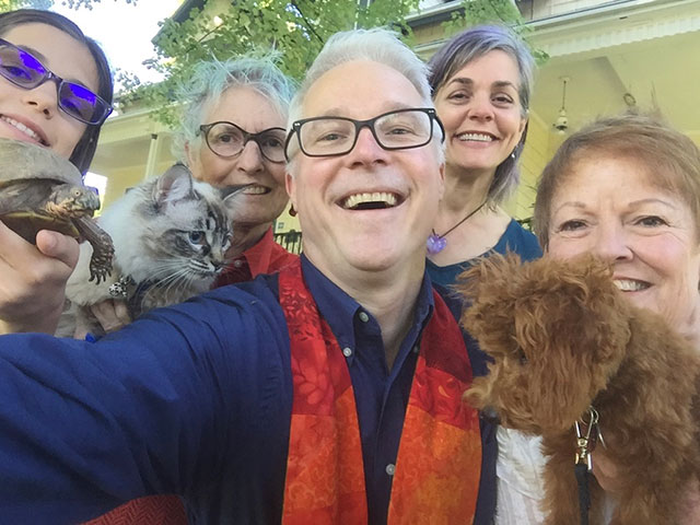 rev. kevin with members and animals