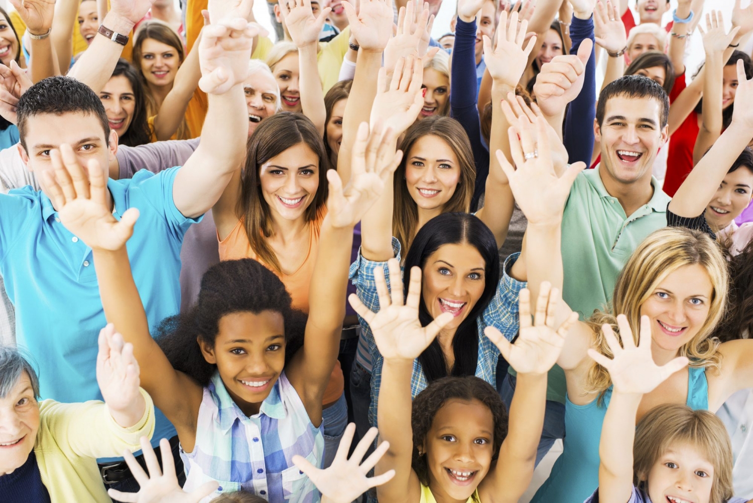 diverse group hands reaching up