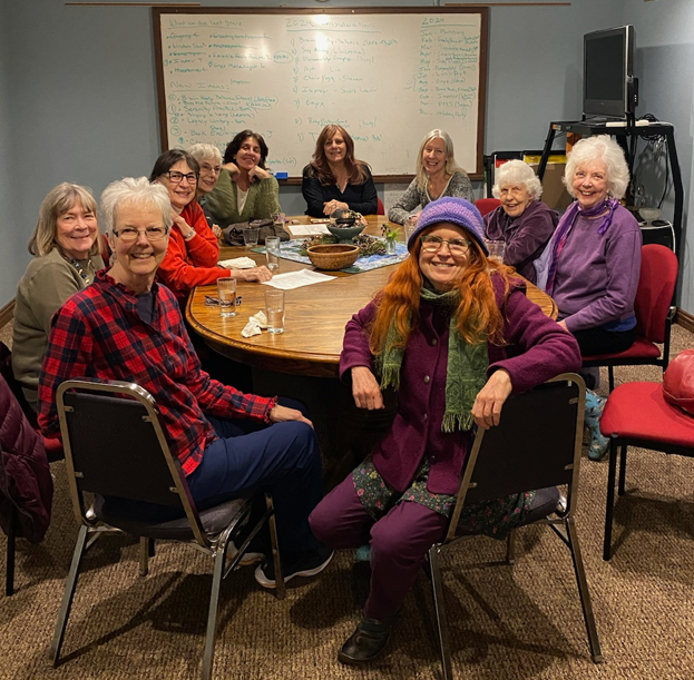 UUCM Women's Circle meeting, January 2024 - women around a large table